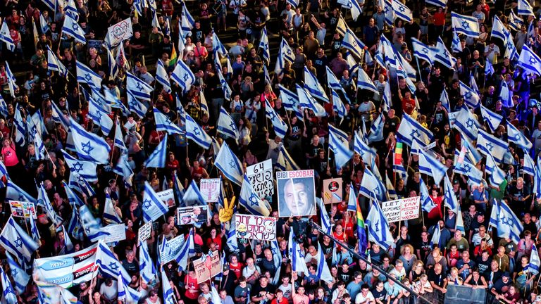 Israelis take part in a demonstration in Tel Aviv against the judicial overhaul in August
