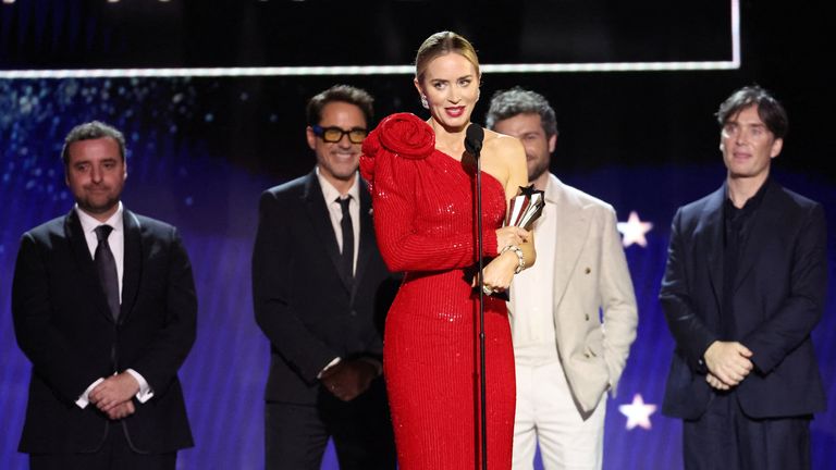 Emily Blunt collects the award for best acting ensemble for Oppenheimer