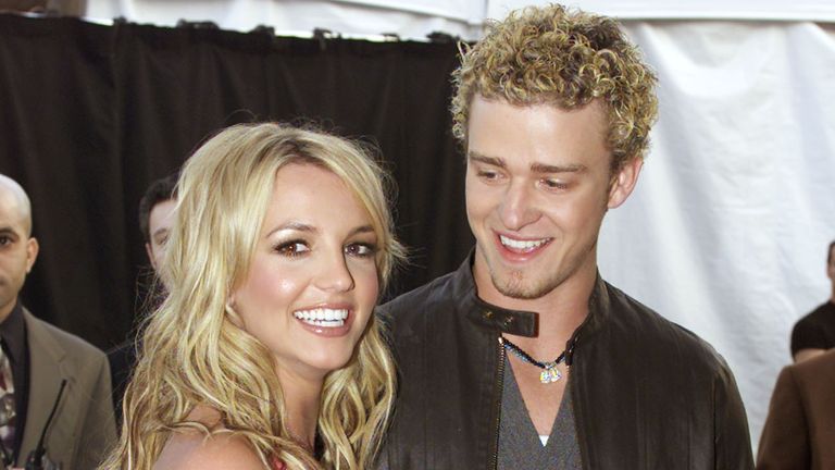 Photo: Reuters Singer Britney Spears and her boyfriend, Justin Timberlake, from the group. "'N sync" Arrive at the 29th annual American Music Awards in Los Angeles on January 9, 2002. Spears is a performer at the awards show that honors artists in Pop, Rock, Rap, Country and Latin Music.  REUTERS/Adrees Latif FSP
