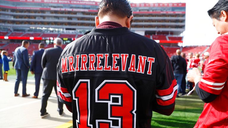 A fan wears a Mr. Irrelevant jersey for San Francisco 49ers quarterback Brock Purdy before an NFL football game between the 49ers and the Arizona Cardinals in Santa Clara, Calif., Sunday, Jan. 8, 2023. (AP Photo/Jed Jacobsohn)