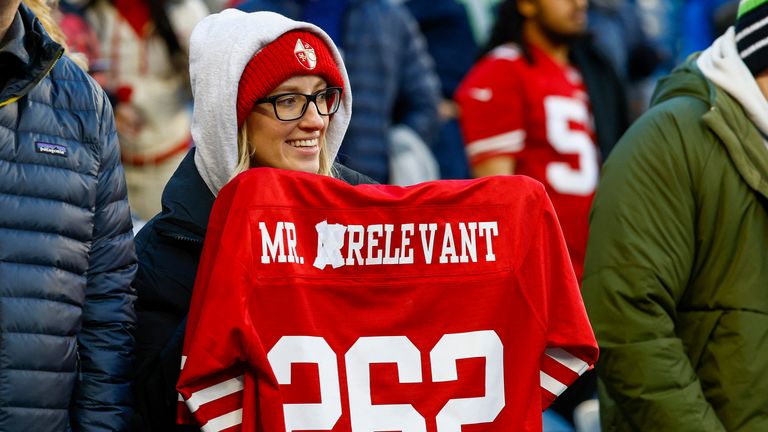 Dec 15, 2022; Seattle, Washington, USA; A fan holds an altered “Mr. Irrelevant” jersey for San Francisco 49ers quarterback Brock Purdy (not pictured) during pregame warmups against the Seattle Seahawks at Lumen Field. “Mr. Irrelevant” refers to the final pick of the NFL draft. Mandatory Credit: Joe Nicholson-USA TODAY Sports
