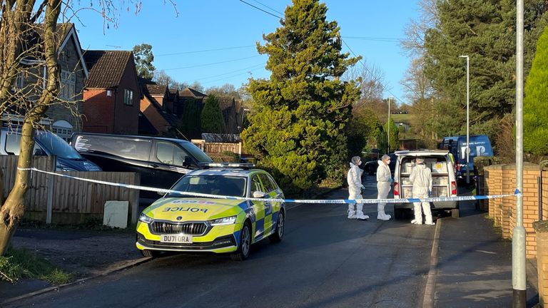 Forensic investigators outside a property in Cheadle, Staffordshire, where two women were found dead on New Year's Eve