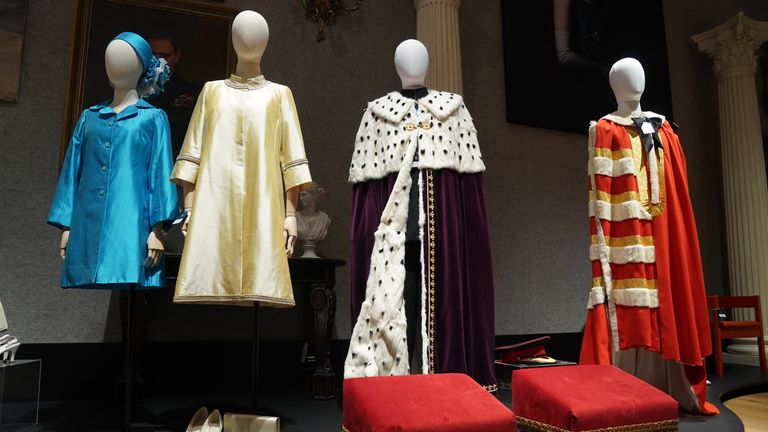 Replica outfits worn by The Royal Family which are part of the collection of more than 450 costumes, sets and props from the Netflix series The Crown, on show at Bonhams in central London, ahead of being auctioned next month. Picture date: Tuesday January 9, 2024.

