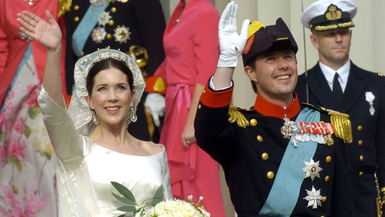 Crown Prince Frederik and Crown Princess Mary wave to the crowds after their wedding in 2004. Pic: AP