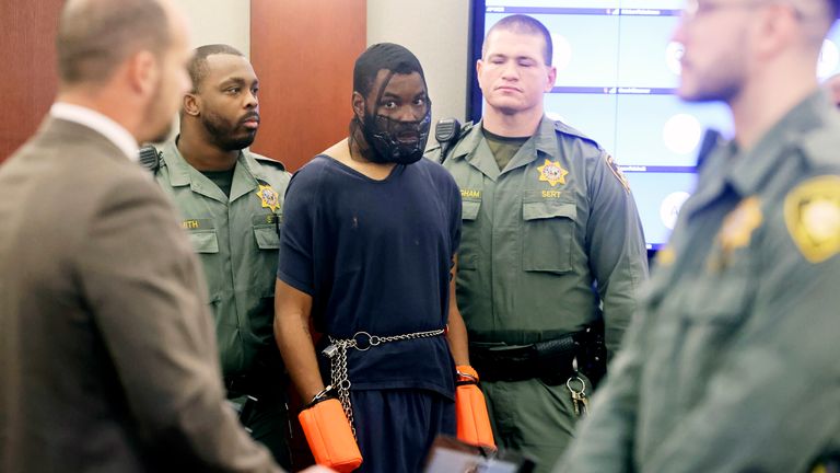 Deobra Redden is escorted into the courtroom 