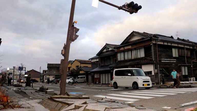 A pavement is broken due to an earthquake in Wajima City, Ishikawa Prefecture, Japan. Pic: AP