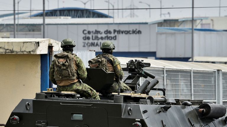 Soldiers arrive atop an armoured vehicle to the Zonal 8 prison after Ecuador&#39;s President Daniel Noboa declared a 60-day state of emergency following the disappearance of Adolfo Macias, leader of the Los Choneros criminal gang, from the prison where he was serving a 34-year sentence, in Guayaquil, Ecuador, January 9, 2024. REUTERS/Vicente Gaibor del Pino