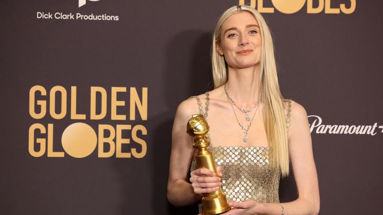 Elizabeth Debicki poses with the award for Best Performance by a Female Actor in a Supporting Role on Television for "The Crown" at the 81st Annual Golden Globe Awards in Beverly Hills, California, U.S., January 7, 2024. REUTERS/Mario Anzuoni
