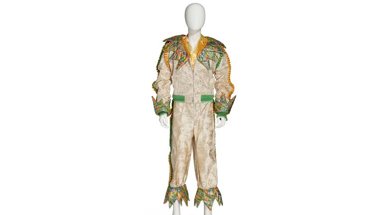 NO ARCHIVING - ONE USE ONLY (unless otherwise agreed in writing by Christie&#39;s Images)..Undated handout photo issued by Christie&#39;s of an ivory and gold jumpsuit ensemble, one of the first stage clothes made for Sir Elton John designed by Annie Reavey. The musician, 76, is curating the sale of objects from his former Atlanta home with his husband David Furnish and in partnership with auction house Christie&#39;s. Issue date: Thursday January 11, 2024. PA Photo. The Collection of Sir Elton John: Goodbye Peachtree Road, which is being sold in Rockefeller Center, New York, includes high value items such as a painting by British artist Damien Hirst of Sir Elton and Furnish. See PA story SALE John. Photo credit should read: Christie&#39;s Images Ltd. 2024/PA Wire ..NOTE TO EDITORS: This handout photo may only be used in for editorial reporting purposes for the contemporaneous illustration of events, things or the people in the image or facts mentioned in the caption. Reuse of the picture may require further permission from the copyright holder.