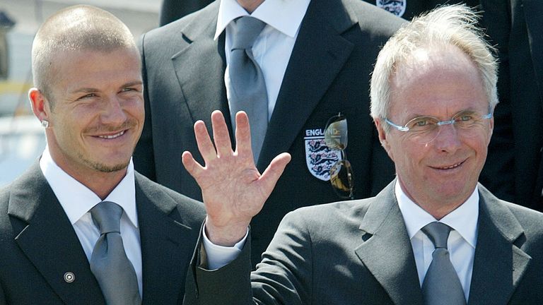 England soccer captain David Beckham (L) and coach Sven-Goran Eriksson (R) pose for photographs with the squad before departing for the Euro 2004 Championships