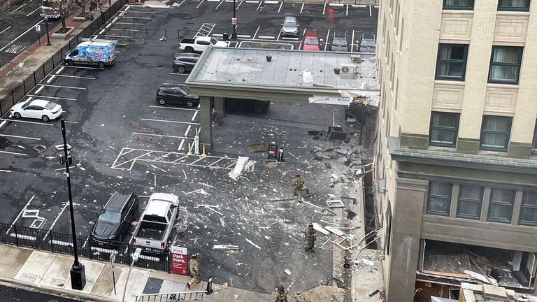 Firefighters work the scene after an explosion at the Sandman Signature hotel on Monday, Jan. 8, 2024, in Fort Worth, Texas. (Kathy Johnson/Special to the Star-Telegram via AP)
