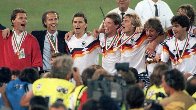 FILED - 08 July 1990, Italy, Rom: Franz Beckenbauer (2nd from left) celebrates winning the World Cup as coach of the German national soccer team in the Olympic Stadium in Rome, surrounded by his players. Germany had beaten Argentina 1:0 in the final. Franz Beckenbauer is dead. The German soccer legend died on Sunday at the age of 78, his family told the German Press Agency on Monday. Photo by: Frank Kleefeldt/picture-alliance/dpa/AP Images


