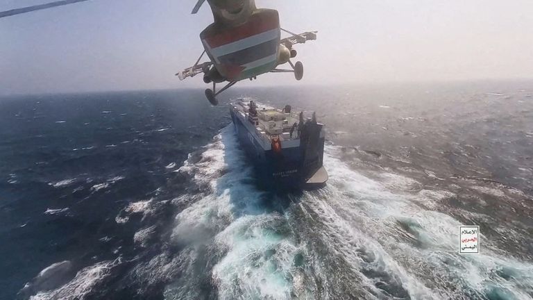 FILE PHOTO: Houthi military helicopter flies over the Galaxy Leader cargo ship in the Red Sea in this photo released November 20, 2023. Houthi Military Media/Handout via REUTERS THIS IMAGE HAS BEEN SUPPLIED BY A THIRD PARTY/File Photo
