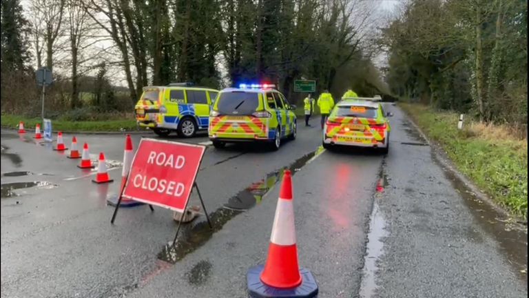 Police at the scene of the incident, on the A433 between Tetbury and Cirencester