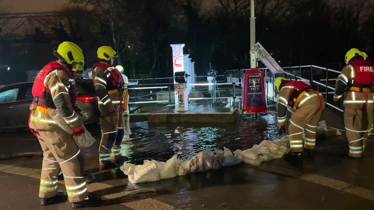 Firefighters working in Hackney against the flooding