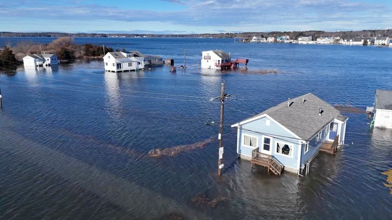 This image provided by Henry Swenson shows flood waters at Hampton Beach, N.H. on Wednesday, Jan. 10, 2024.  A major storm drenched the Northeast and slammed it with fierce winds, knocking out power to hundreds of thousands following a bout of violent weather that struck most of the U.S. (Henry Swenson via AP)