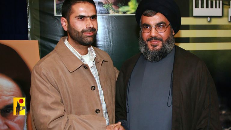 Wissam Tawil, left, who was killed in Kherbet Selem village pictured with Hezbollah leader Sayed Hassan Nasrallah
Pic:Hezbollah Military Media/APO