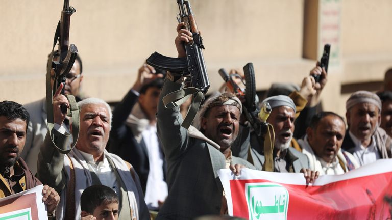 Houthi supporters hold up their weapons during a demonstration against the United States decision to designate the Houthis as a foreign terrorist organisation, in Sanaa, Yemen January 20, 2021. REUTERS/Khaled Abdullah
