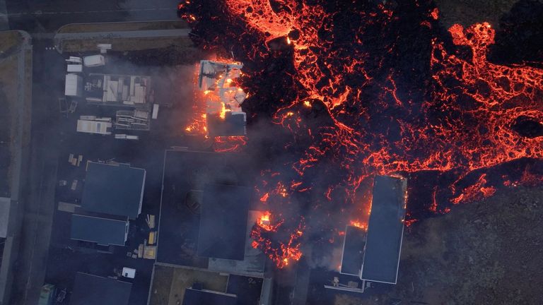 Lava flows from a volcano as houses burn in Grindavik, Iceland
Pic:@bsteinbekk/Reuters
