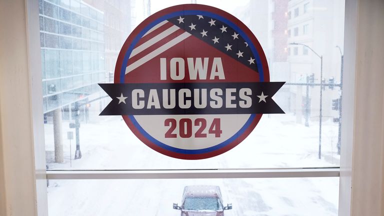 An Iowa Caucus sign in downtown Des Moines, Iowa. Pic: AP