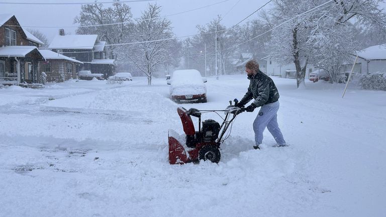 Pic: AP
Matt Stilwell of Des Moines, Iowa, uses a snowblower to clear his driveway and sidewalk at him home Tuesday, Jan. 9, 2024 in Des Moines, Iowa.   It was the first significant snowfall of this winter in the area.  (AP Photo/Scott McFetridge)