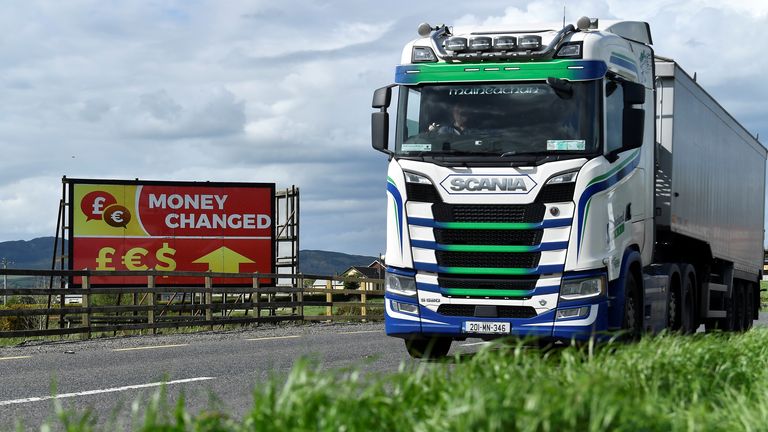 A truck drives past a &#39;money changed&#39; sign for euro, sterling and dollar currencies on the border between Northern Ireland and Ireland.
File Pic: Reuters