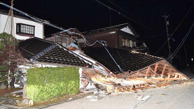 Some houses are destroyed by an earthquake in Anamizu Town, Ishikawa Prefecture, Japan. Pic: AP