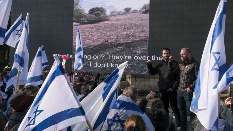 Pro-Israel activists gather near the International Court of Justice today