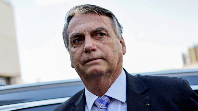 Former Brazilian President Jair Bolsonaro leaves the Federal Police headquarters after testifying about the January 8 riots, in Brasilia, Brazil, October 18, 2023. REUTERS/Ueslei Marcelino