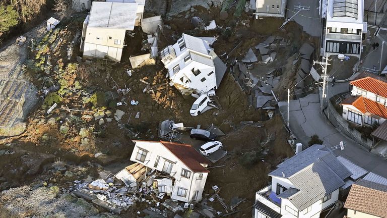 An aerial view shows collapsed houses after the earthquake in Kanazawa