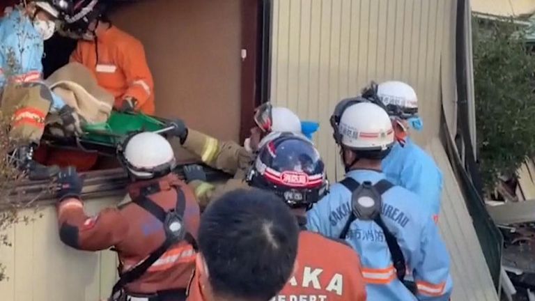 Rescue crews in Japan find a woman alive in quake rubble after three days