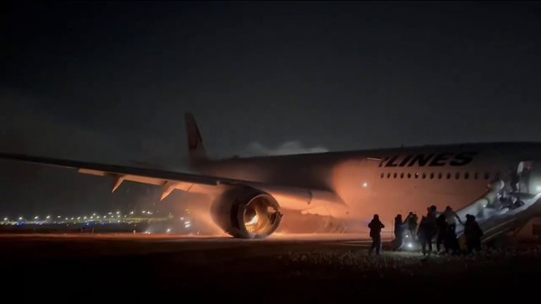 New footage of passengers evacuating burning plane in Japan | World ...