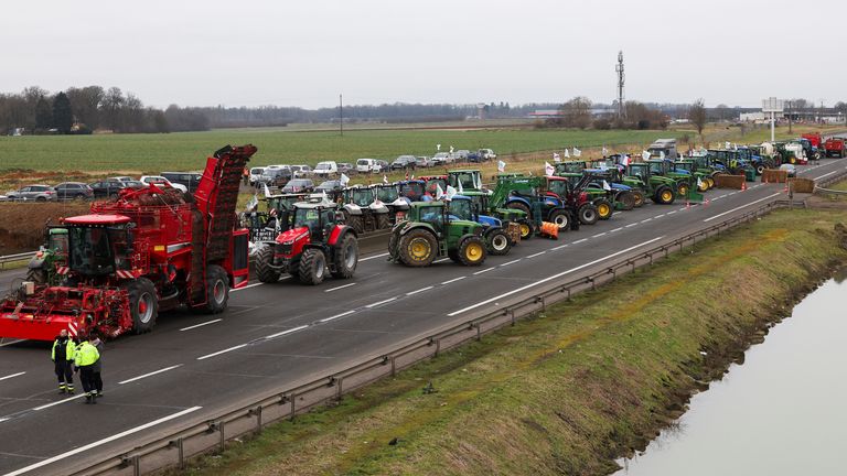 Vehicles are lined up during a blockade by farmers on the A4 in Jossigny.
Pic: Reuters