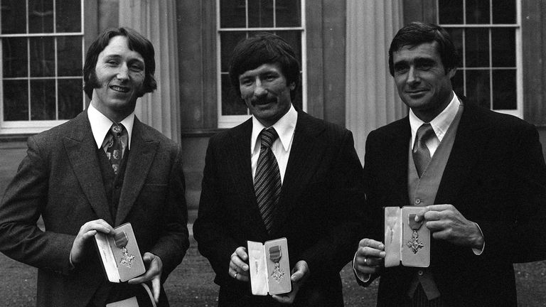 JPR Williams, the Welsh international rugby star, Tommy Smith, the Liverpool soccer player, and tennis star Roger Taylor at Buckingham Palace after receiving their MBE s.