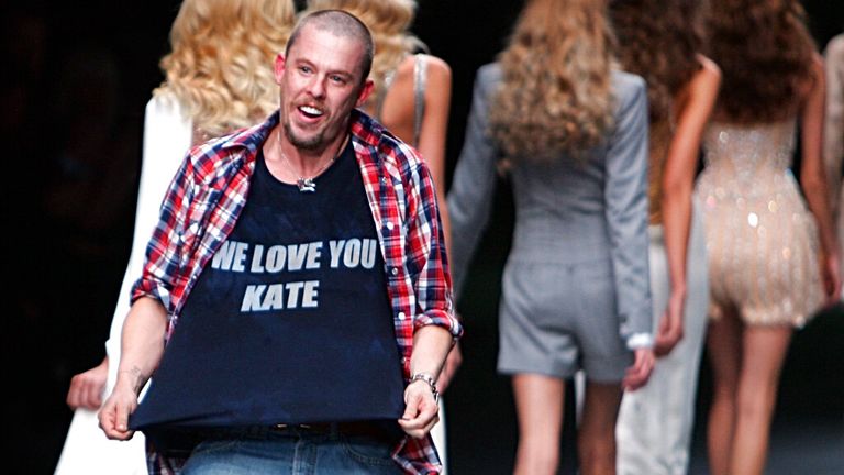 British fashion designer Alexander McQueen at the end of his Spring/Summer 2006 collection in Paris, Oct 7 2005. His shirt logo refers to Kate Moss after photos her apparently snorting cocaine in a London music studio were published in the Daily Mirror. Soon after she lost contracts with H&M, Burberry and Chanel. Pic: AP/Remy de la Mauviniere


