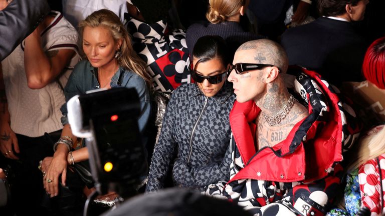 Kate Moss, Kourtney Kardashian and Travis Barker attend the Tommy Hilfiger Fall 2022 collection presentation at the Skyline Drive-In during New York Fashion Week in Brooklyn, New York City, U.S., September 11, 2022. REUTERS/Andrew Kelly