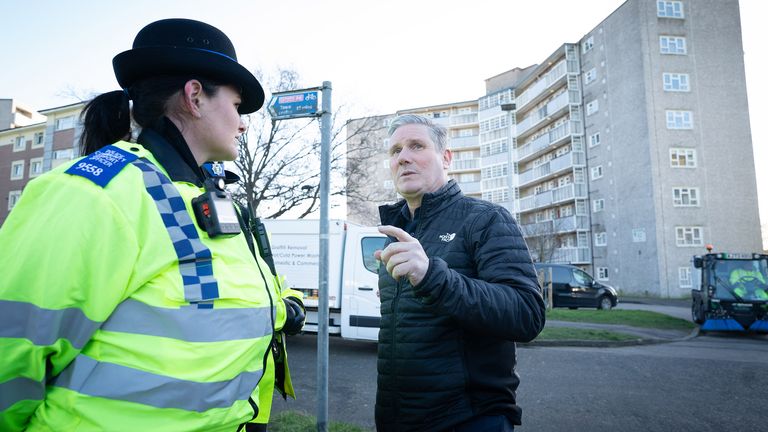 Keir Starmer meets police officers during a visit to an area affected by antisocial behaviour in Reading.
Pic:PA