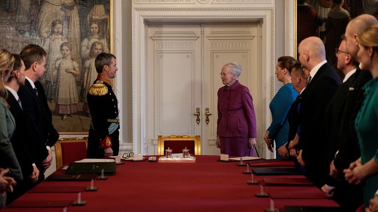  Denmark&#39;s former Queen Margrethe leaves the place at the head of the table to her son Frederik