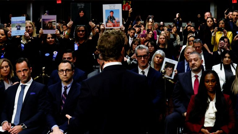 Mark Zuckerberg stands and faces the public, some with placards, during the Senate Judiciary Committee hearing on online child sexual exploitation.
Pic: Reuters