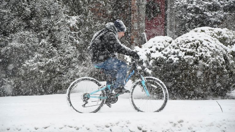 Pic: AP
A cyclist navigates the sidewalk along State Road in North Adams, Mass., on Sunday afternoon, Jan. 7, 2024, during the height of the snowstorm. (Gillian Jones-Heck/The Berkshire Eagle via AP)