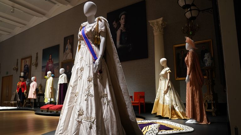 A reproduction of Princess Margaret&#39;s coronation gown, which is part of the collection of more than 450 costumes, sets and props from the Netflix series The Crown, on show at Bonhams in central London, ahead of being auctioned next month. 