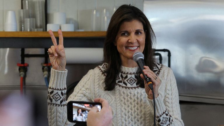 Republican presidential candidate and former U.S. Ambassador to the United Nations Nikki Haley gestures indicating a two person race after opponent Florida Governor Ron DeSantis suspended his campaign, during a campaign stop at Brown’s Lobster Pound ahead of the New Hampshire primary election in Seabrook, New Hampshire, U.S., January 21, 2024. REUTERS/Brian Snyder
