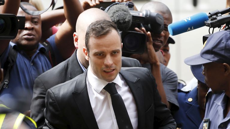 Oscar Pistorius arrives at the North Gauteng High Court in Pretoria, South Africa