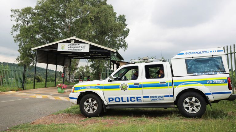 A police vehicle is parked at the entrance of the Atteridgeville Correctional Centre, where South African athlete Oscar Pistorius, who was convicted of killing his girlfriend Reeva Steenkamp in 2013, was released on parole, in Pretoria, South Africa January 5, 2024. REUTERS/Alet Pretorius