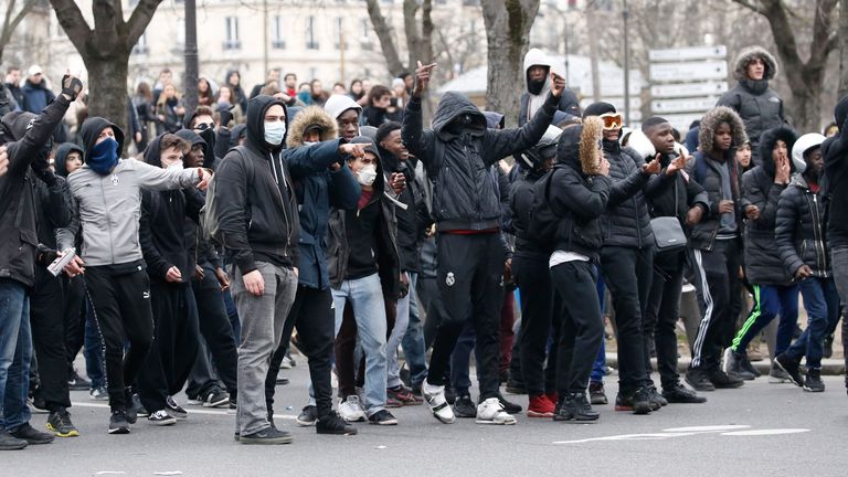 Protesters in a stand-off with police in Paris over the assault of Theodore Luhaka by police in 2017