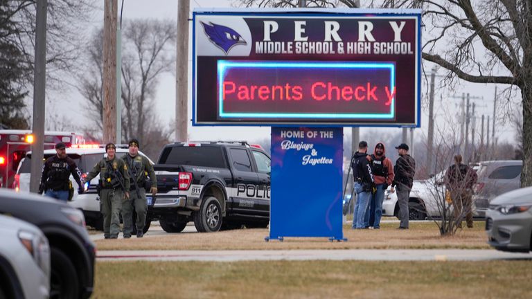 Police respond to the Perry High School shooting