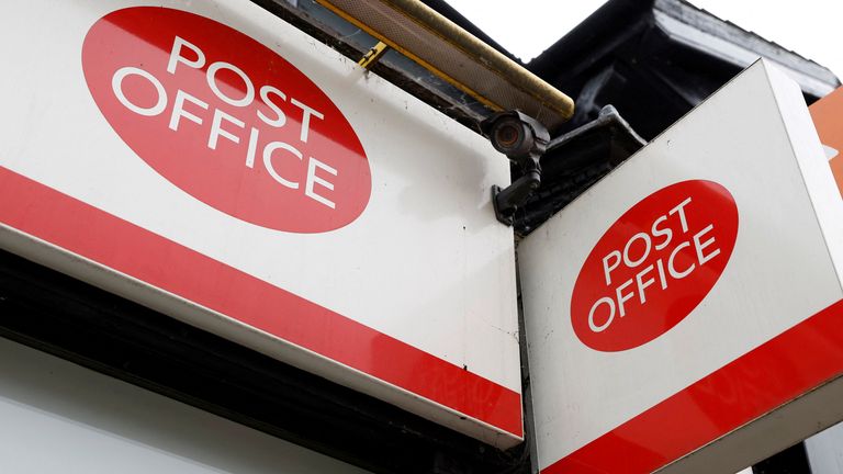 A Post Office sign REUTERS/Peter Cziborra/File Photo
