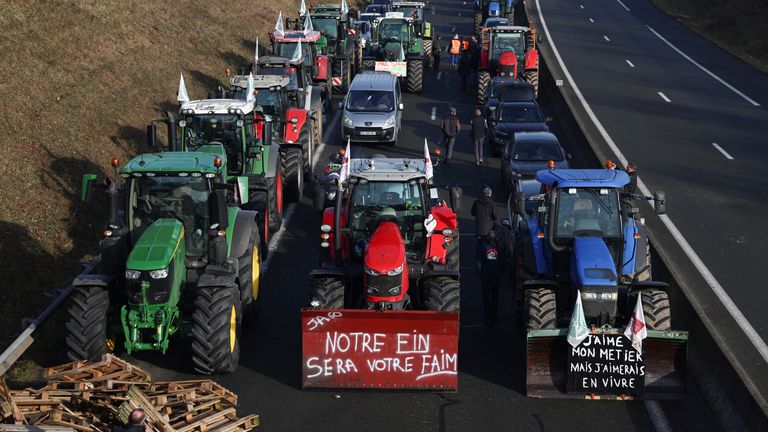 Tractors and other vehicles line the A16 motorway as French farmers try to reach Paris during a protest in Beauvais-Pec: Reuters