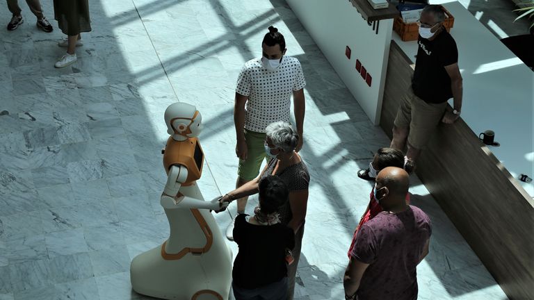 The robot greeted patients. Pic: Assistance Publique Hopitaux de Paris/PA