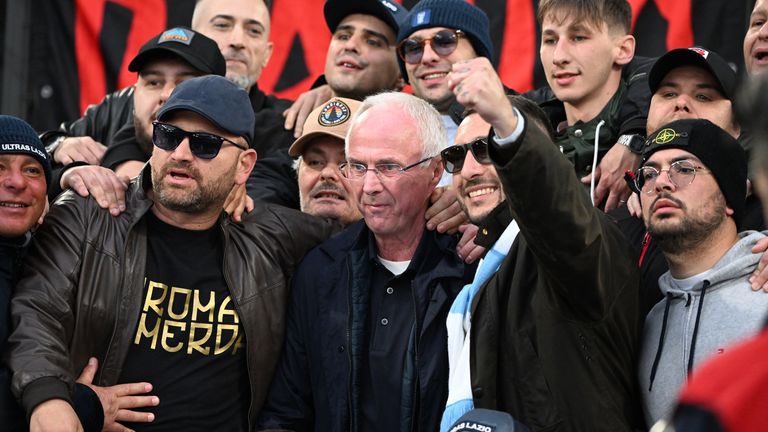 Former Lazio coach Sven-Goran Eriksson poses with Lazio fans before the match